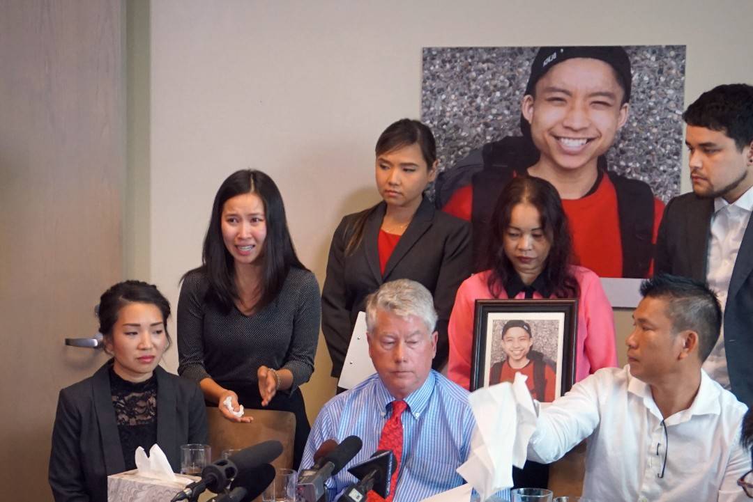 Tommy Le’s family, joined by their lawyers, held a press conference in September to discuss autopsy results that showed the Burien man was shot in the back. Photo by Daniel Person