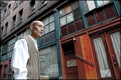 Wing Luke Museum Executive Director Ron Chew near the East Kong Yick Building.