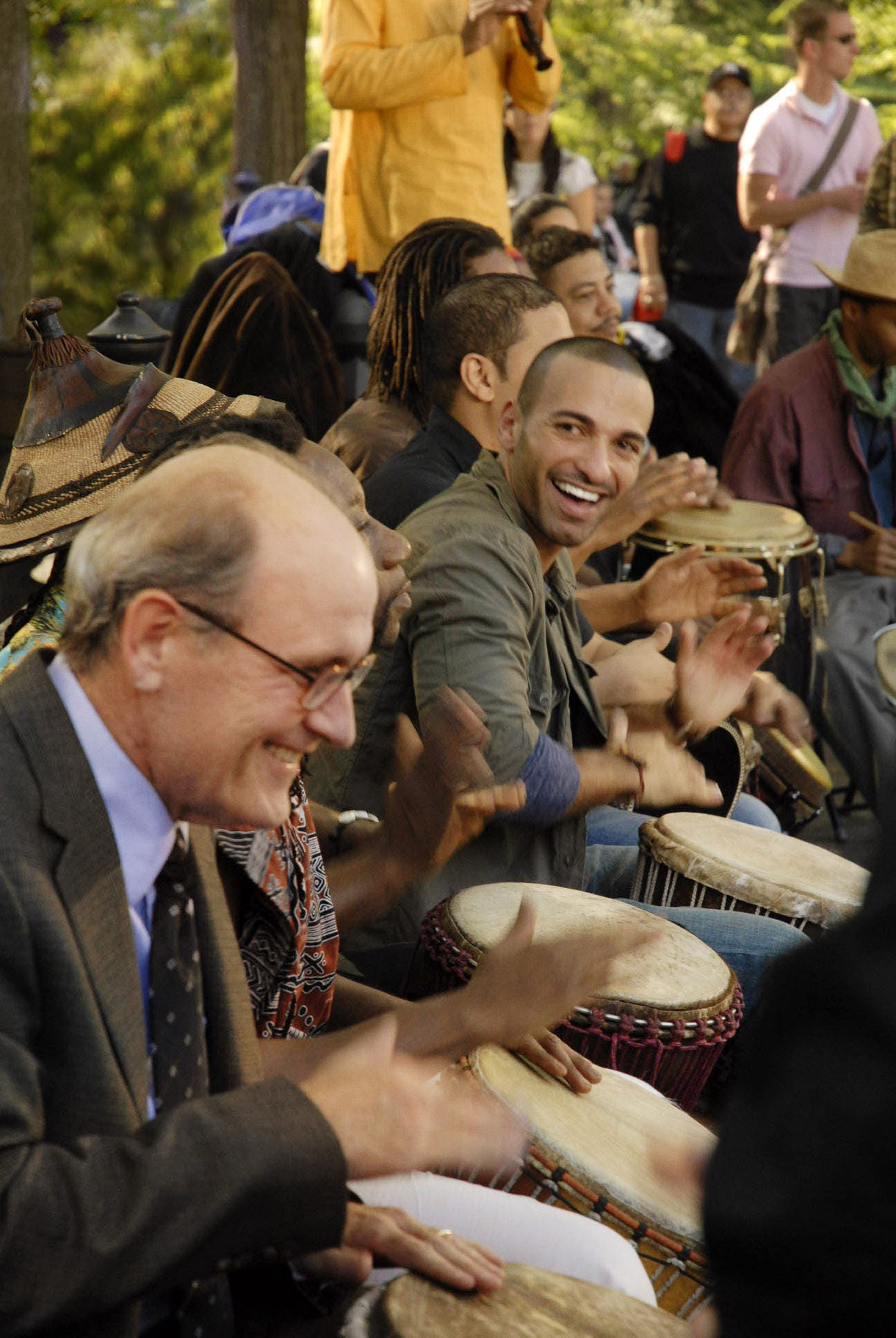 Jenkins (left) learns the beat from Sleiman.