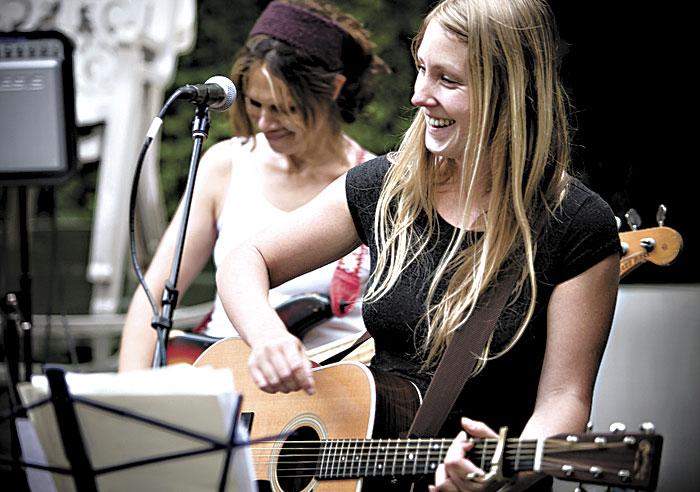 Rebecca Young (left) and Zoe Muth practice for the No Depression Festival.