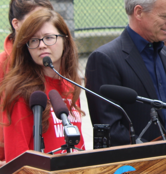 Jess Spear at Mayor Murray's signing of the $15 minimum wage ordinance, a campaign she was a lead organizer for. Photo by Kelton Sears.