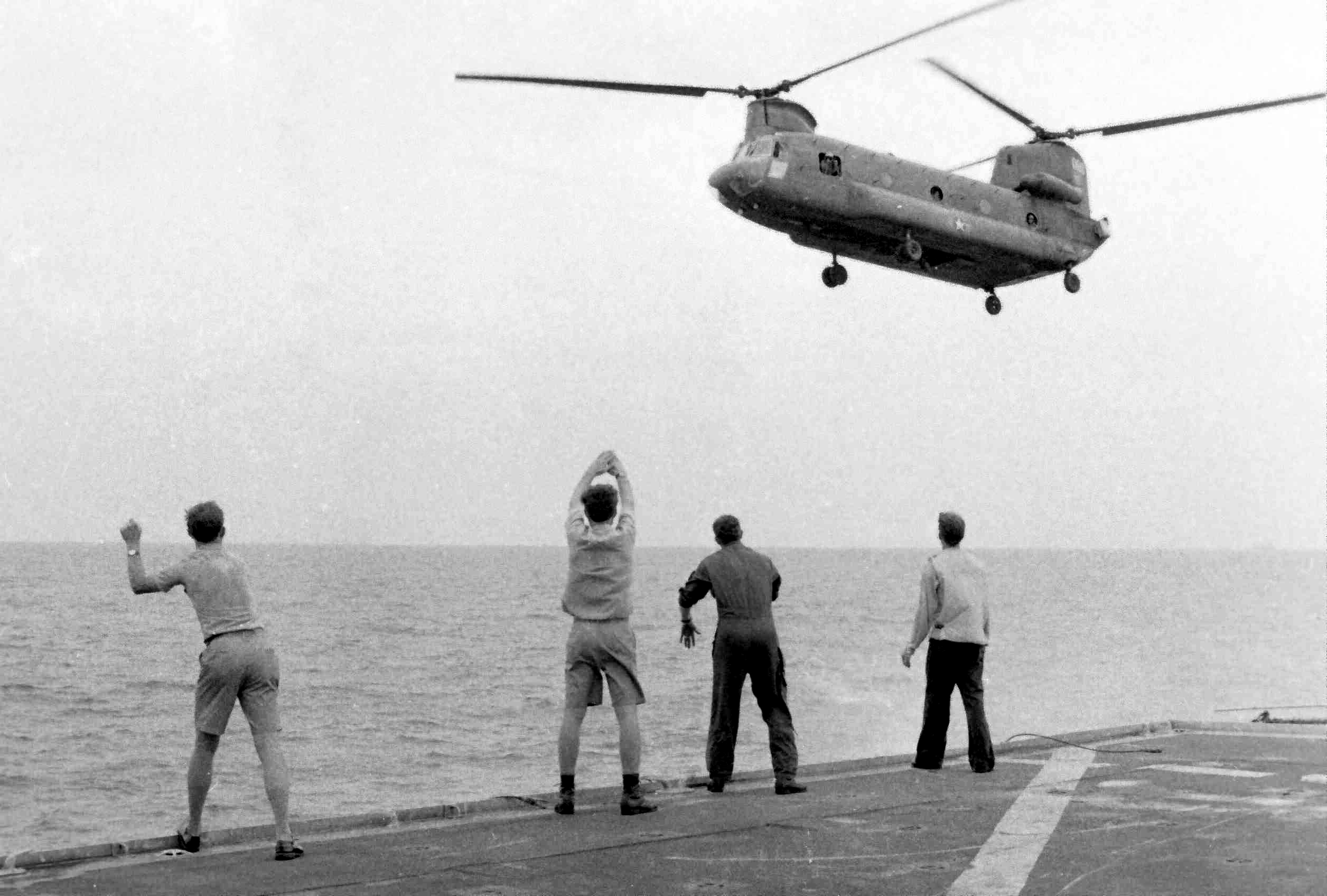 A Vietnamese pilot saves his family (with a baby tossed to the sailors!) during the airlift.lastdaysinvietnam.com