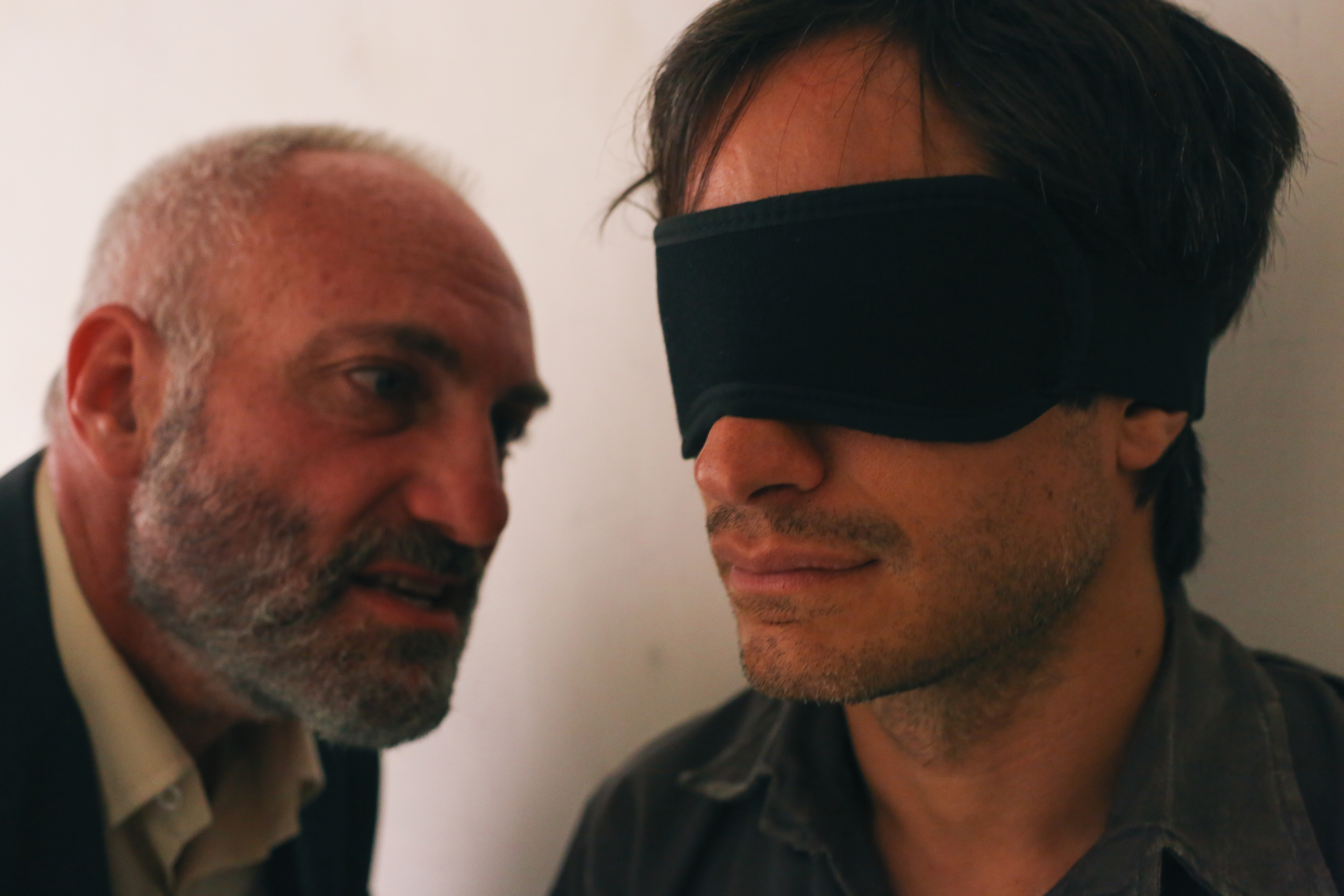 The interrogator (Bodnia) and his quarry (GarcIa Bernal).Nasser Kalaji/Open Road Films