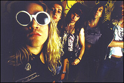 Wood (at left) in the glam days of grunge.