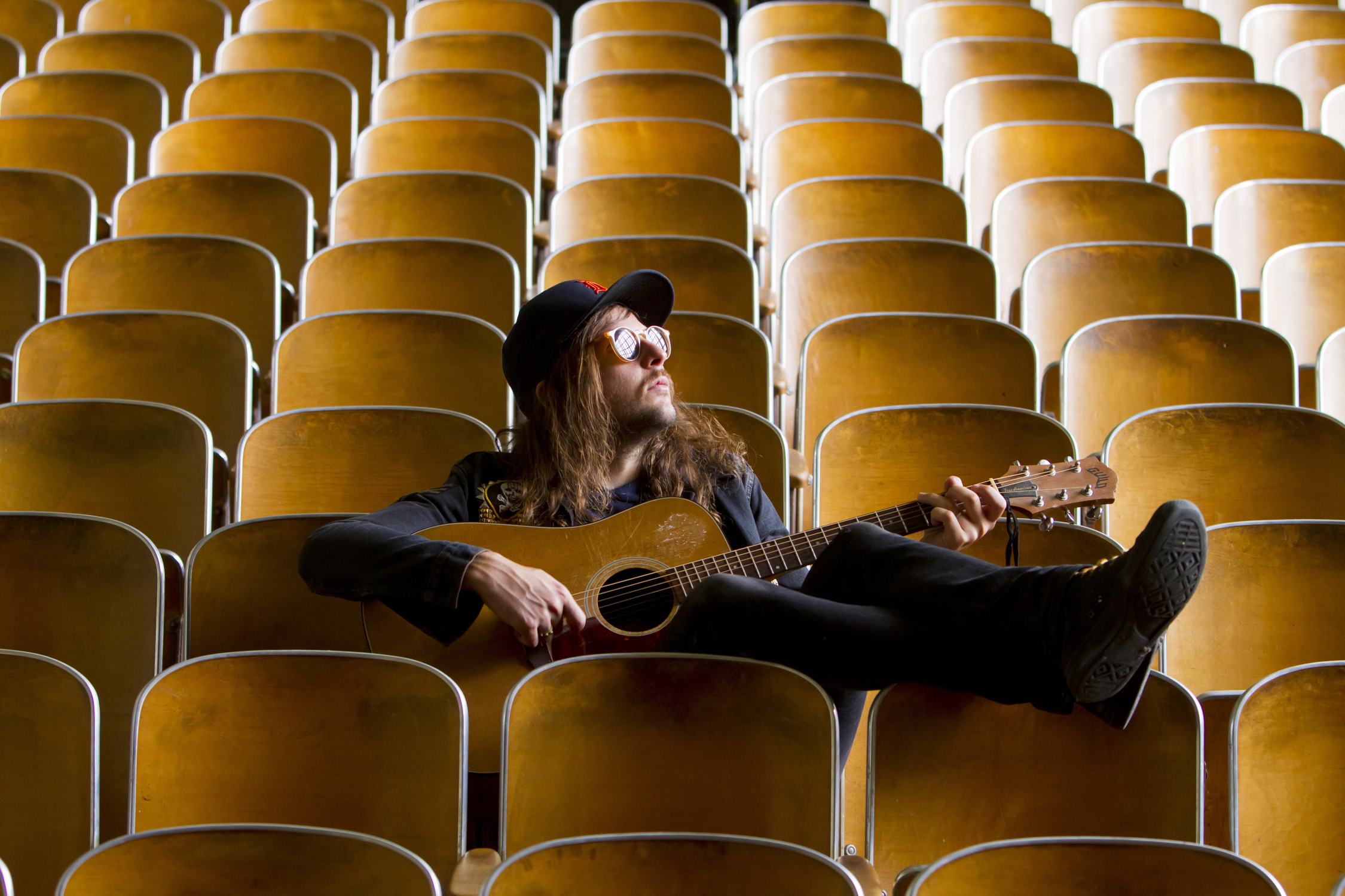 King Tuff, aka Kyle Thomas, poses for portraits at Malcolm X Academy —an abandoned school that was purchased by a real estate developer and rented out as, among other things, a recording studio— in Detroit, MI, while recording with Robert Harlow, of The Go and Conspiracy of Owls, Thursday, July 7, 2011. (Photo By Jeffrey Sauger)