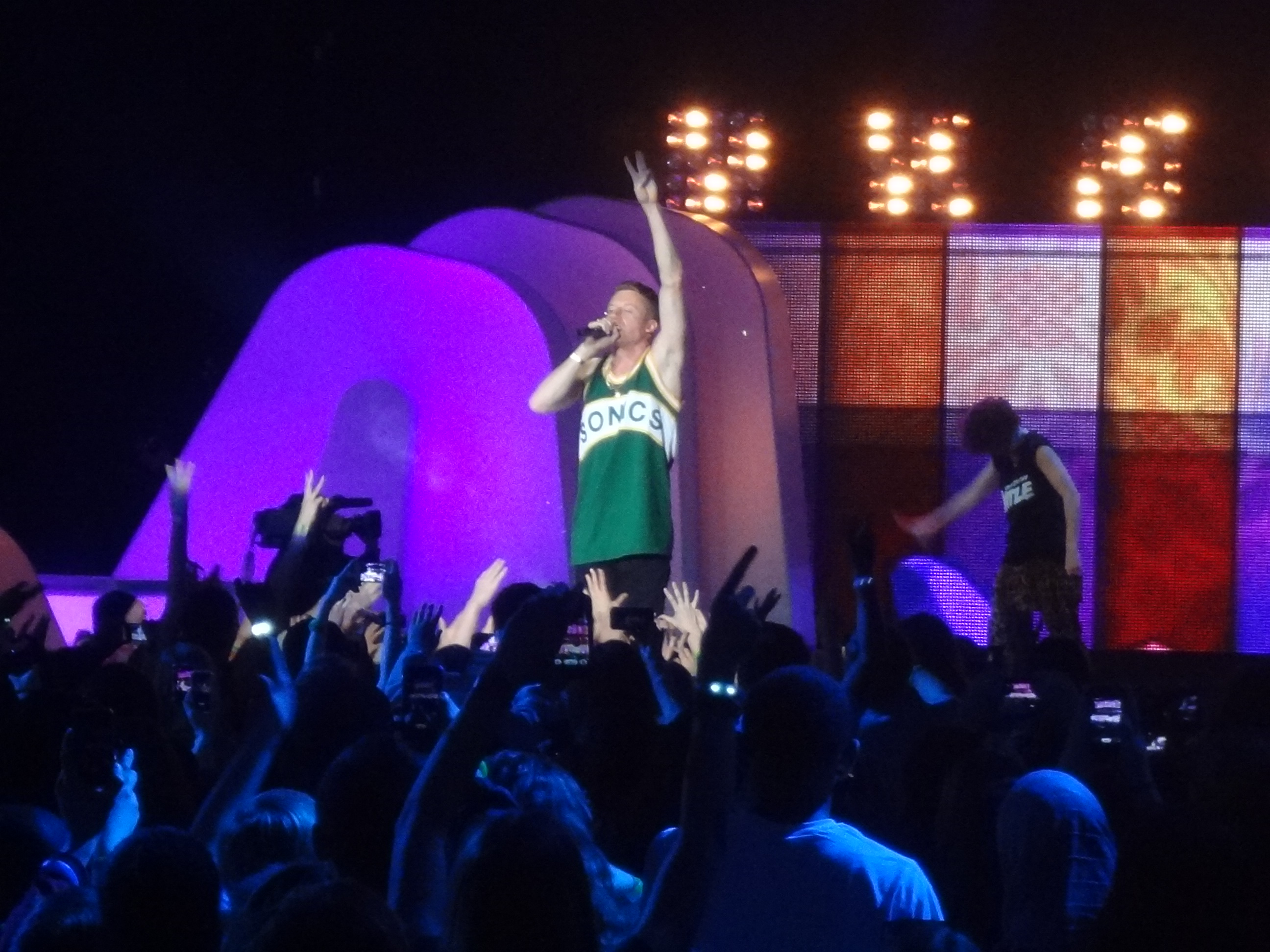 Macklemore and Ryan Lewis bust out a surprise We Day performance.