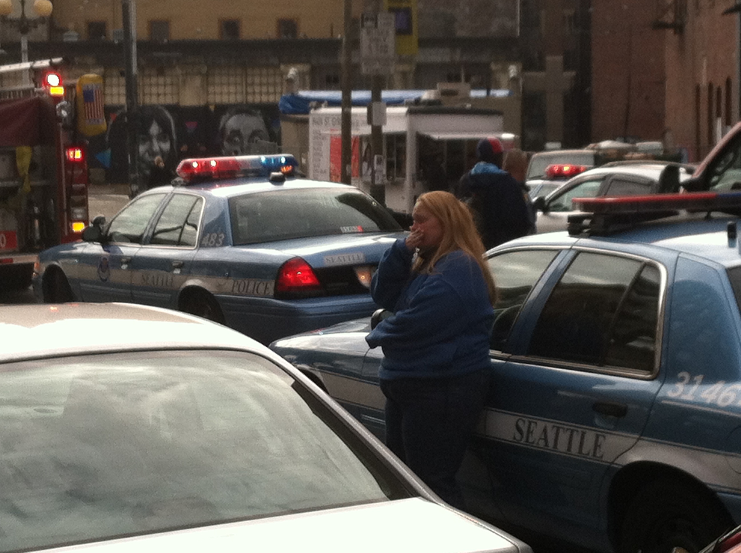 A witness reacts to the shooting inside Union Gospel Mission