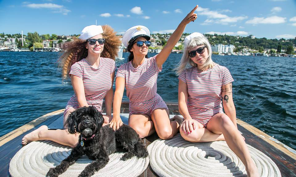 Co-hosts Anna Urband, left, and Lisa Gallo, right, float along with host Bobbi Rich.